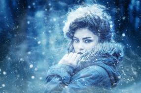 the girl in the snow is beautifully cute