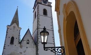 white church in front of a streetlight