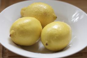 fresh lemons in a bowl