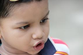 Portrait of the cute child saying something