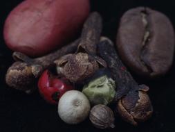 peeled vegetables on a black background