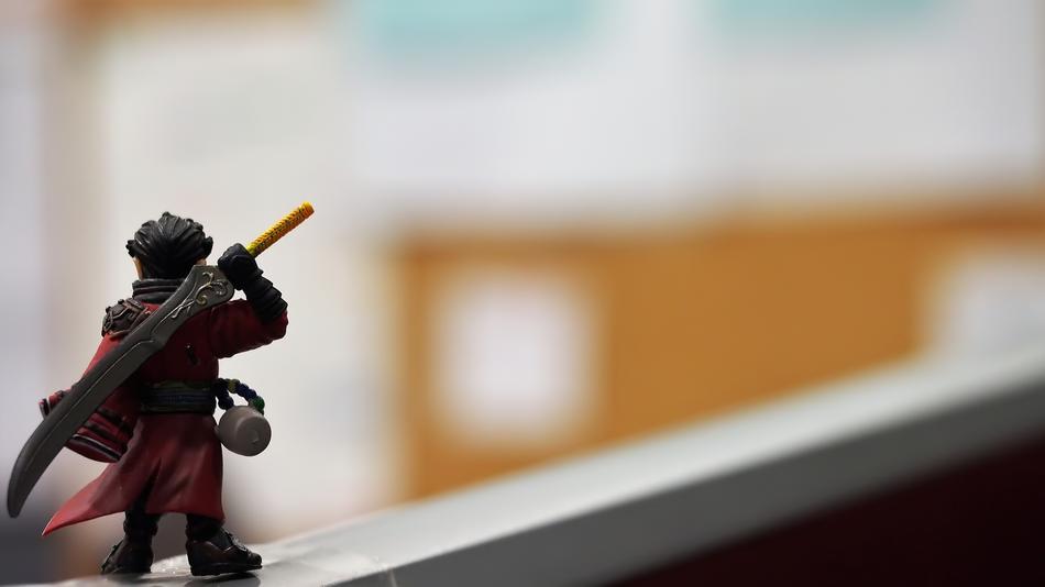 Japanese warrior figurine at blur background