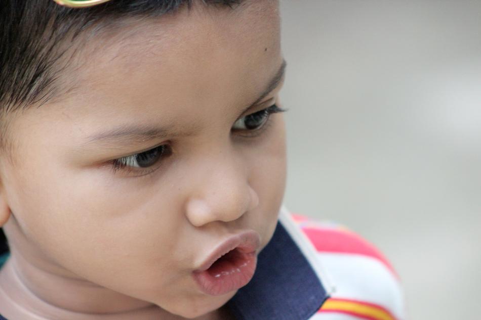 Portrait of the cute child saying something