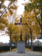 cross in autumn leaves