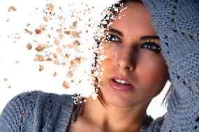 an unusual photo of a girl in a blue sweater