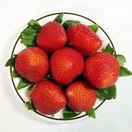 juicy strawberries in a plate
