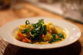 porridge with vegetables in a plate
