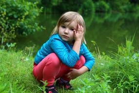Mati Child Girl at lake coast