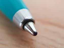 Pen Ball Writing close-up on blurred background