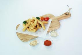 Roasted potatoes on a board