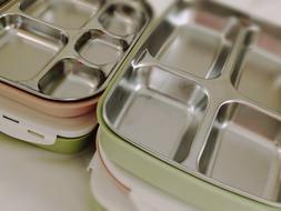 Close-up of the colorful, shiny metal containers, with the reflections