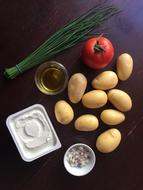 peeled potatoes with tomato and sauce