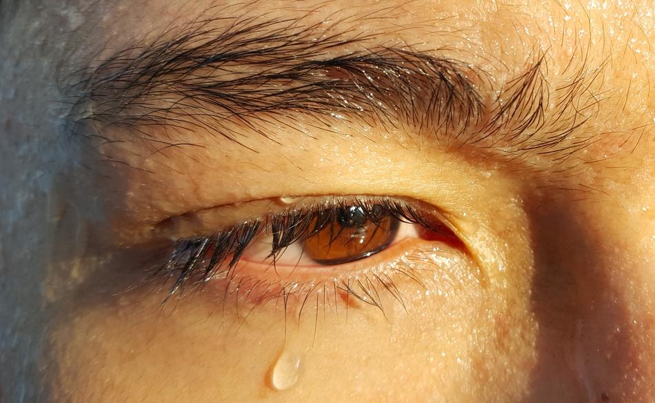 weeping asian woman eye close up