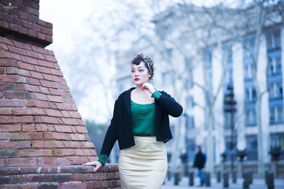 photo portrait of a model plus on the background of a city building