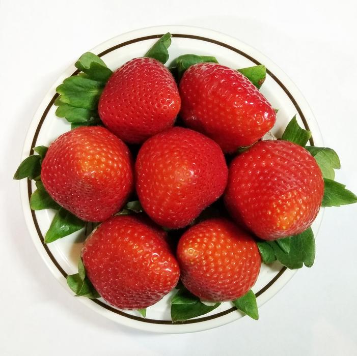 juicy strawberries in a plate