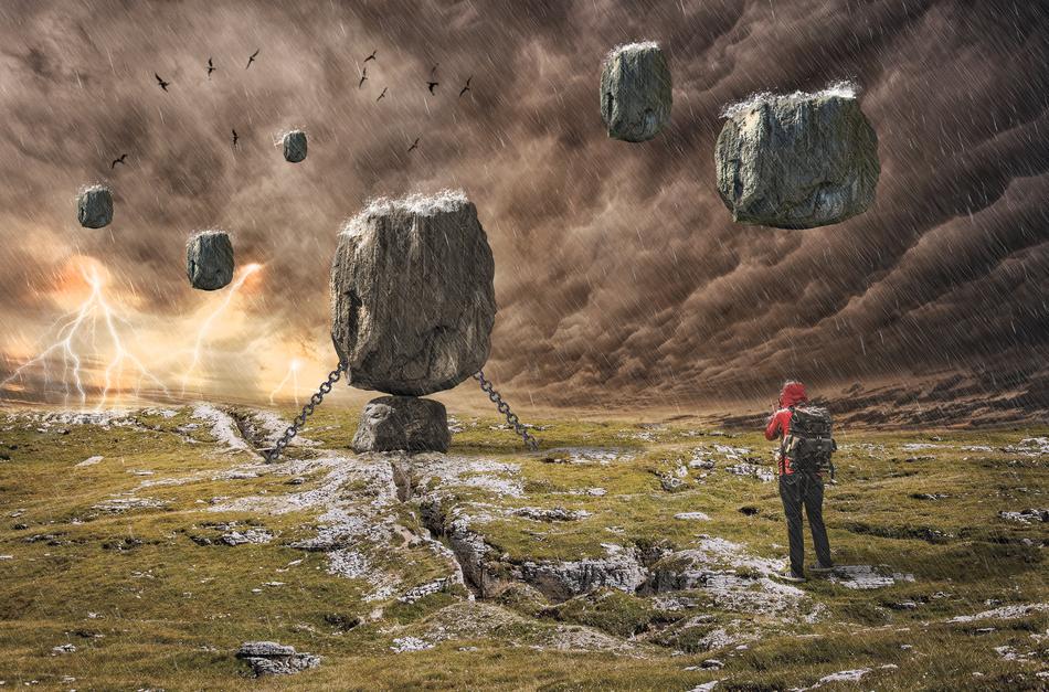stone cubes near the man