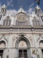 facade of the gothic cathedral against the blue sky