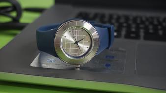 Technology Hand Watch on laptop