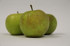 ripe apples on a white background