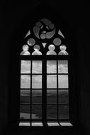 a glorious window in the dark