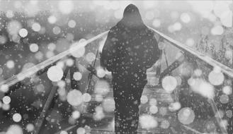 Person on Bridge at Snowy weather