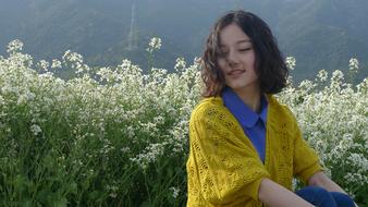 beautiful girl in a yellow scarf