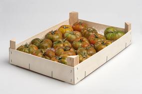 colored tomatoes in a box