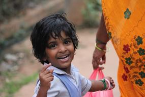 happy girl with mom in India