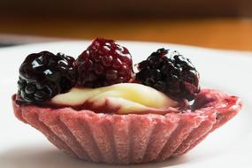 sweet berries on a cupcake