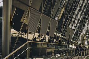 reflection of windows and steel structures of a modern building