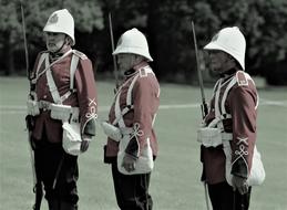 adult men in military uniform on the field