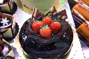 Chocolate cake decorated with strawberries