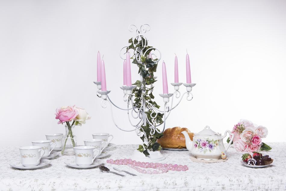pink candles and a decorated table
