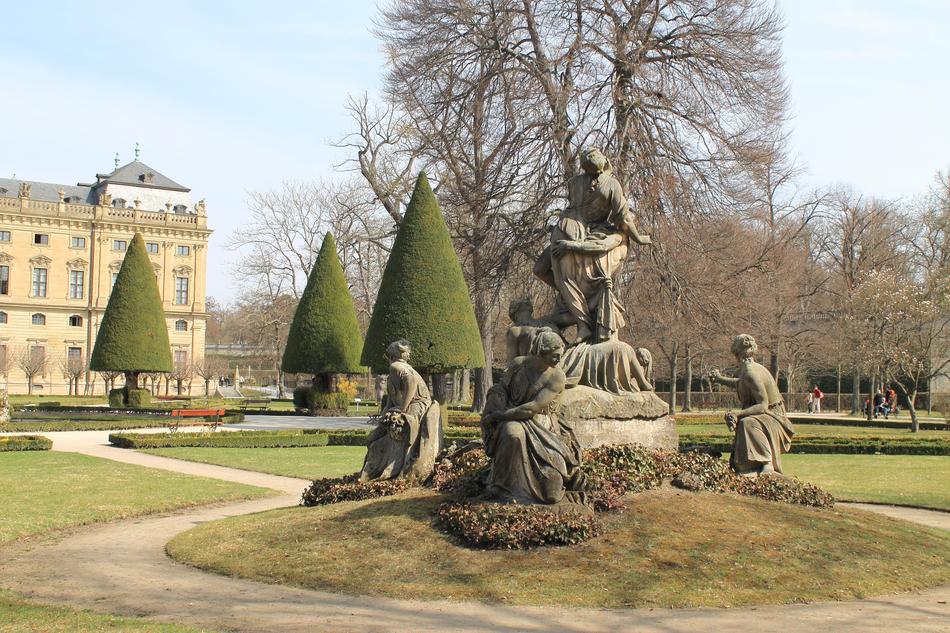 green Christmas trees at the house with sculptures