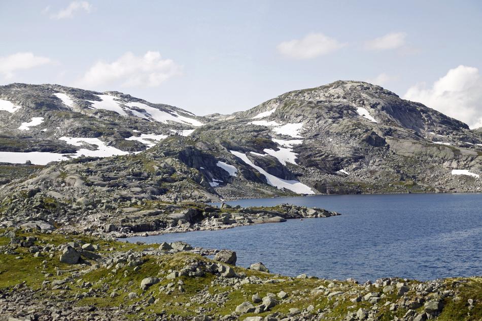mountain with snow and lake