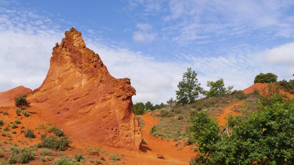 red stone with trees view