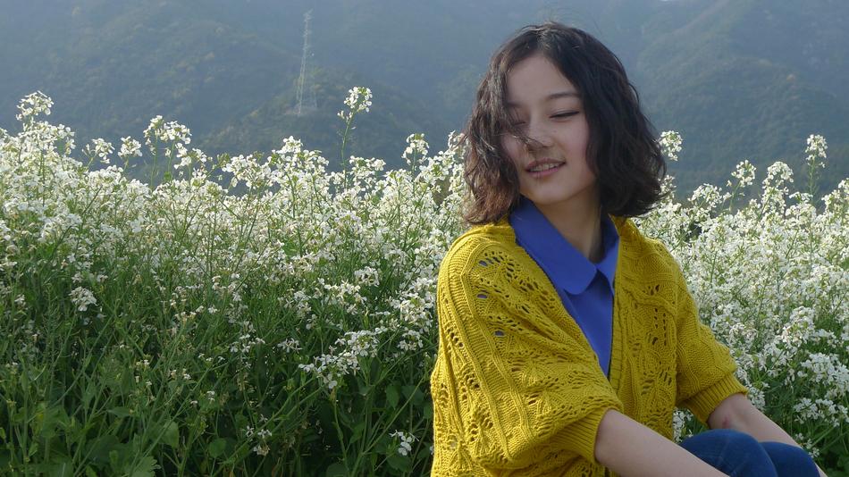beautiful girl in a yellow scarf