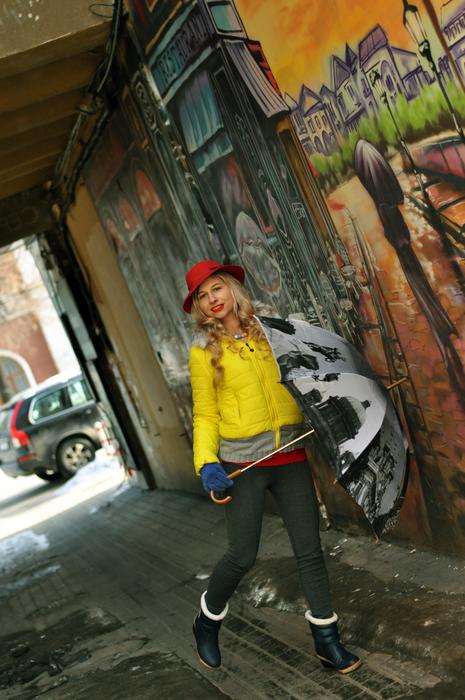 photo of girl with umbrella on street