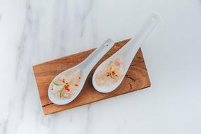 fish snack on a spoon