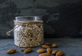 Useful nuts in a jar against the wall