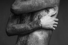 Black And White photo of dirty body