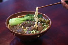 soup with meat and noodles