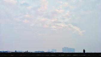 silhouettes of people city