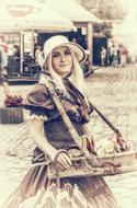 portrait of girl in vintage costume on street