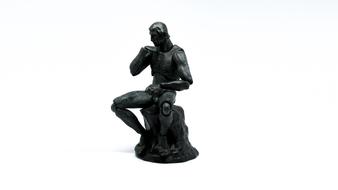 black sculpture with white background