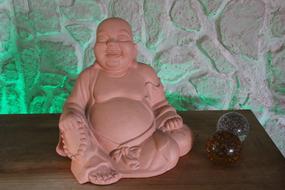 small buddha on the cabinet