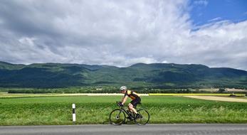 Cyclist Outdoors Grass