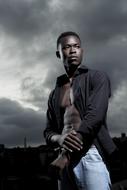 Portrait of black Man and dark sky