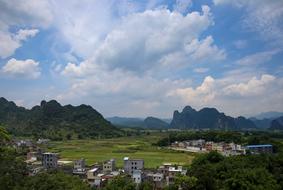 mountains with clouds and grass