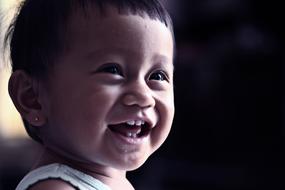 Portrait of Child laughing